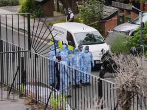 Forensic officers at an address in Shepherd’s Bush, west London, after human remains were found in two suitcases near the Clifton Suspension Bridge in Bristol