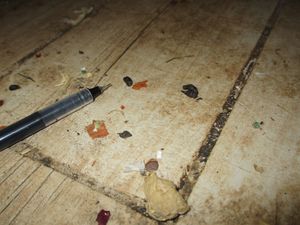 Work surfaces were found to have not been cleaned properly