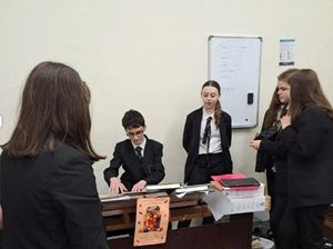 Thomas Womack (Year 9 student) sharing his piano skills to fellow students Beth Hyde (Year 10), Amelia Gandy, Hannah Roelake and Polina Tarabanovska (Year 9 students).