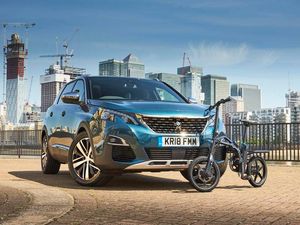 Supporting image for story: Peugeot electric bike aims to solve commuter parking woes