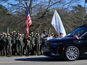 Supporting image for story: Jimmy Carter’s coffin travels to Atlanta as 39th US president’s funeral begins