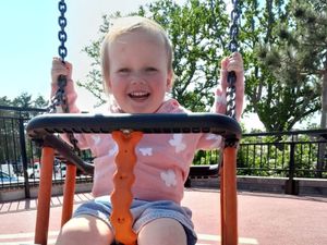 Annabel Mackey, two, in a swing