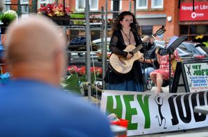 Kelly O'Connor performs for revellers