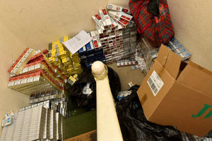 A large amount of illicit cigarettes are discovered on a landing