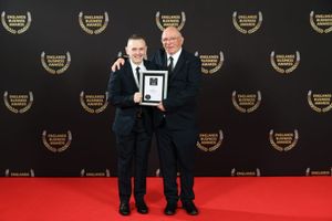 Telford business owner Stuart Henderson and occupational health consultant Paul Fernley with the award