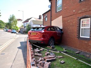 Supporting image for story: Driver taken to hospital as 'precaution' after Jaguar SUV smashed into Telford house - ambulance service