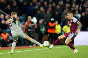 AZ Alkmaar's Dani de Wit and Aston Villa's Lucas Digne battle for the ball