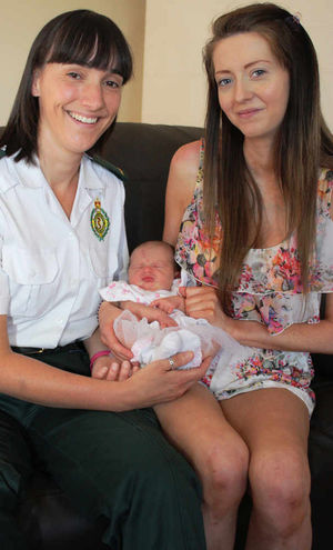 Paramedic Nikki Wildman, baby Ella Nicola and mum Melissa Cavanagh
