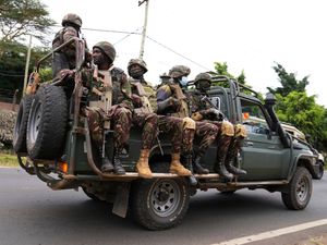 Supporting image for story: Police clash with protesters in Kenya as military patrols the streets