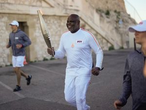 Supporting image for story: Torchbearers in Marseille kick off Olympic flame’s journey across France