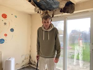 Kevin Smith at his home in Stourbridge where the ceiling has fallen in due to water in the roof space. Picture Martyn Smith/LDRS free for LDRS use