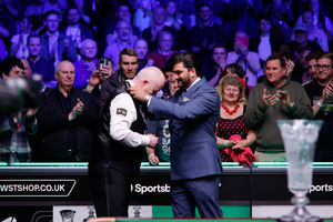 Runner-up John Higgins kept it tight in the final until 7-7 but Zhao Xintong raced away late on to win 10-7. Pic: WST