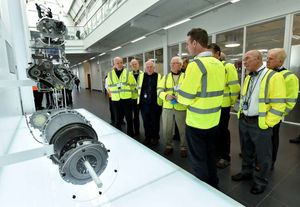 Pensioners from Cannock Chase Probus Club are given a guided tour by staff member Gareth Slater