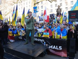 People take part in a rally in support of Ukraine outside Downing Street, London