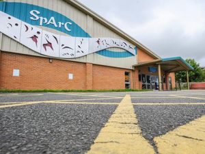 Supporting image for story: Spencer and Swan Lake on screen at community theatre