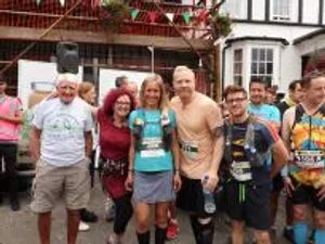 Gordon with supporters including Bernice Benton and Sophie Raworth, volunteers and racers at a previous event