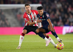 Southampton's Jan Bednarek (left) brings down Aston Villa's Ollie Watkins