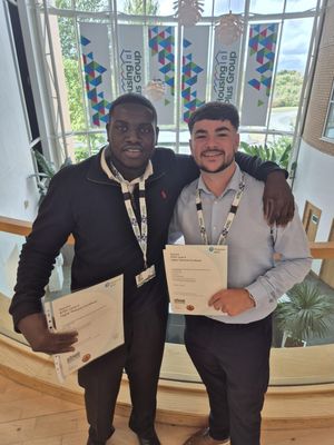 Aiden and Dennis are celebrating completing their apprenticeships at Housing Plus Group
