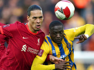 Supporting image for story: Classy Liverpool hero Virgil van Dijk provides Shrewsbury Town goalscorer Daniel Udoh with ultimate memento