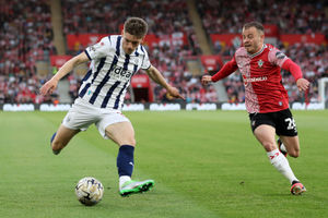 Tom Fellows whips in a dangerous ball (Photo by Adam Fradgley/West Bromwich Albion FC via Getty Images).
