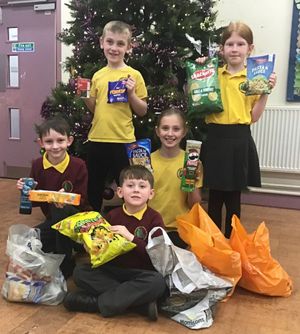 School Council members with some of the foodbank donations