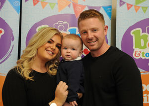 Winner for the zero to nine months category Louie Ellis, with mother and father Lynsey and Sean Ellis