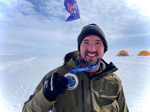 Supporting image for story: Athlete becomes first person in wheelchair to complete marathon challenge