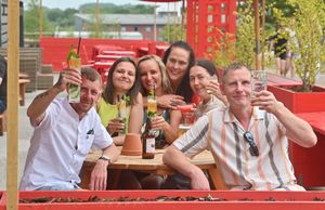Enjoying a refreshing drink in Telford amid sweltering temperatures.