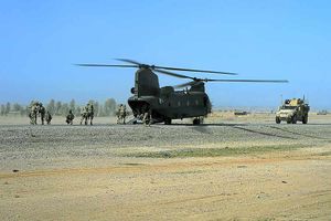 The walking wounded are helped into the helicopter after the explosion