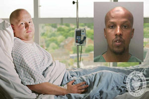 Pc Adam Koch recovers in hospital after the attack. Inset, Mohamoud Elmi