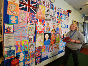 Supporting image for story: Corgis, union jacks and portraits of the Queen decorate library for Jubilee