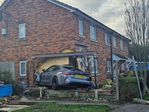 A BMW car smashed into a house in Ketley Telford.