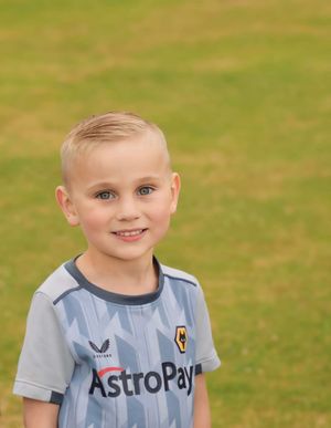 Toby is now thriving after surgery and loves football