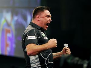 Supporting image for story: Gerwyn Price eases past Keane Barry to reach third round at Alexandra Palace