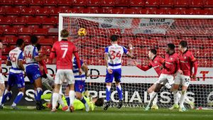 Tyler Sackey scores for Reading