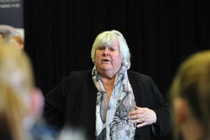 Headteacher, Maureen Brennan, speaks at a meeting