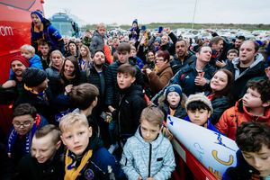 Excited fans gathered to watch the players arrive ahead of the game