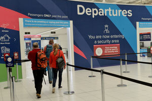 Holidaymakers set off on a flight to Portugal from Birmingham Airport