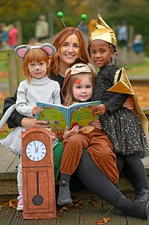 WOLVERHAMPTON COPYRIGHT NATIONAL WORLD TIM STURGESS 11/11/24. Nursery rhyme week at Elston Hall primary school, Wolverhampton. Left, Emmie, Maisie and Akira with phase leader Ciara Burns.