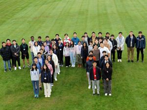 Supporting image for story: Maths students celebrate striking gold