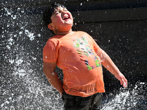 Children enjoyed the water in Queen Square, Wolverhampton