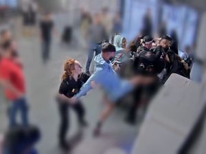 Supporting image for story: Jury shown CCTV footage of alleged assault on police at Manchester Airport