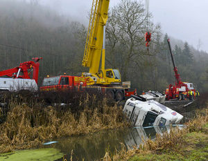 The operation to lift the lorry from the canal