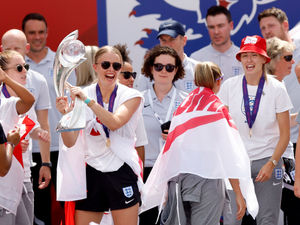 England goalkeeper Hannah Hampton celebrates winning the European Championships.