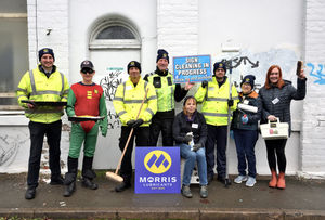 John Edwards with Liam Caswell and Richard Edwards from Morris Lubricants and other volunteers busy cleaning off the graffiti at the Severn Hospice Superstore