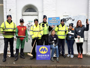 Supporting image for story: Shrewsbury's 'Sign Guy' gets a helping hand to clean up hospice shop