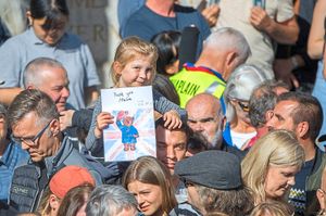 A special tribute from one girl as the coffin is moved to St Giles’ Cathedral