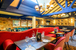 The dining area is full of light and colour