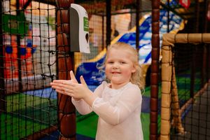 Georgie Linkins, from Telford, making use of one of the 26 hand sanitiser dispensers around the building