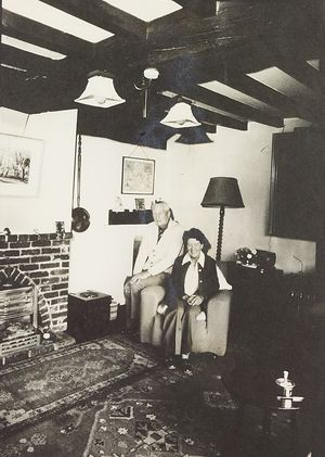 The Buttery, Shifnal. The property belonging to Eric and Rosemary Emerson had been due for demolition in the 1930s, when Major Kenneth Hutchinson Smith dismantled it beam by beam and brick by brick and rebuilt it in Castlecroft Gardens in Wolverhampton. The photograph shows the Emerson couple by the fireplace in September 1978.